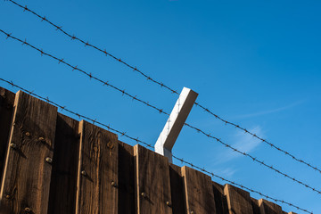 barbed wire wooden fence border war crysis news