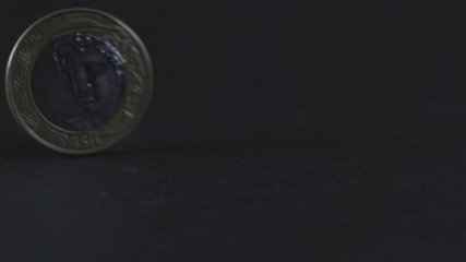 slow motion brazil coin - Powered by Adobe