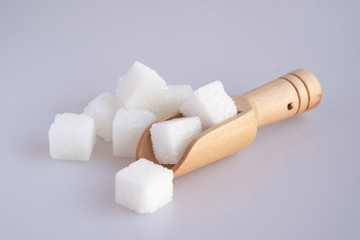 White sugar cube on white background.