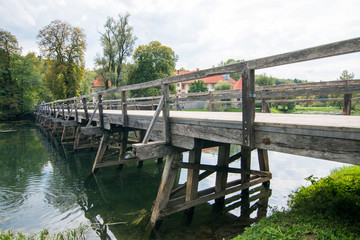 wooden bridge over the river
