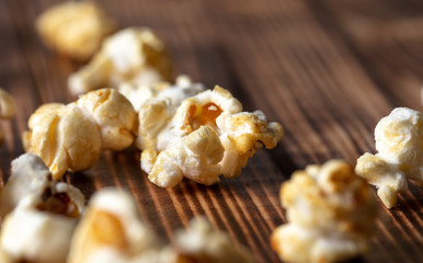 Popcorn flakes on a wooden background
