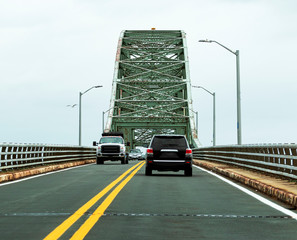 Driving up the Robert Moses Bridge with cars in both lanes