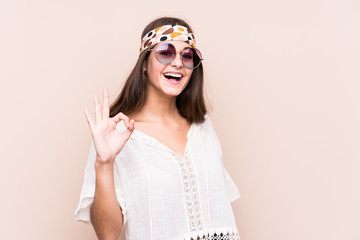 Young hipter caucasian woman isolated cheerful and confident showing ok gesture.
