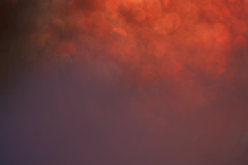 Abstract photo of red smoke  bokeh light on backdrop