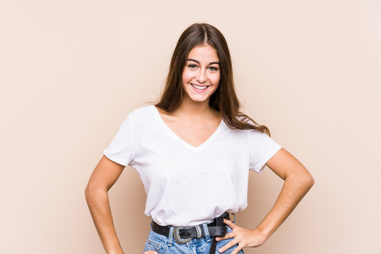 Young caucasian woman posing isolated confident keeping hands on hips.