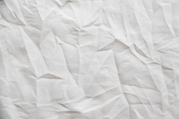 White wrinkled canvas cloth texture background