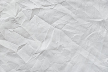 White wrinkled canvas cloth texture background