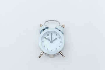 Simply flat lay design Ringing twin bell vintage classic alarm clock Isolated on white background....
