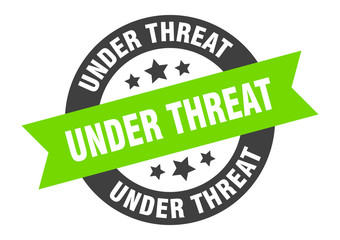 under threat sign. under threat round ribbon sticker. under threat tag