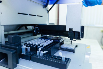 A group of scientists conducts research in a scientific laboratory using advanced technology.