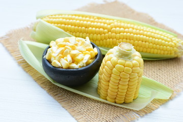  fresh organic corn in leaf, shelled and in pieces