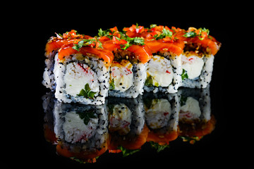japanese sushi roll on black background