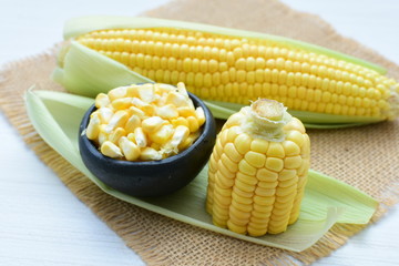  fresh organic corn in leaf, shelled and in pieces