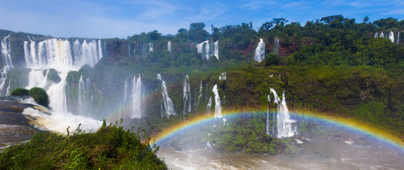 Rainbow over Cataratas del Iguazu waterfall, Brazil