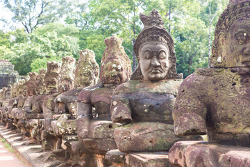 stone faces at Angkor Thom South Gate entrance, Cambodia