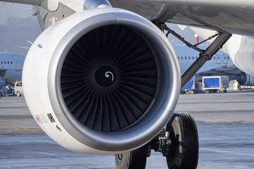 turbine jet engine CFMI CFM56-5B passenger aircraft airbus A320, on the background of the runway. turbine blades, civil aviation, aircraft engine manufacturing