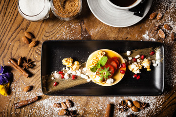 Toffee Panna Cotta served with a cup of coffee