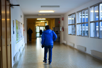 man in hospital corridor