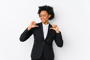 Middle aged african american business  woman against a white background isolated feels proud and self confident, example to follow.