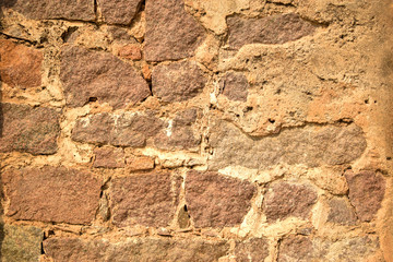 Pattern of Rough Grunge Vintage Stone Wall Texture light yellow Color Background
