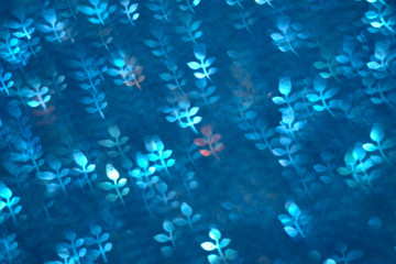 Fototapeta na wymiar Blue glitter vintage lights background. defocused.