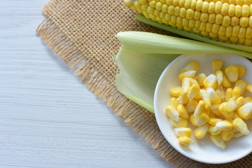  fresh organic corn in leaf, shelled and in pieces