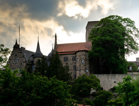 The ancient castle Adelebsen (Burg Adelebsen) in the middle of Germany, Europe with beautiful sky and clouds and backlight