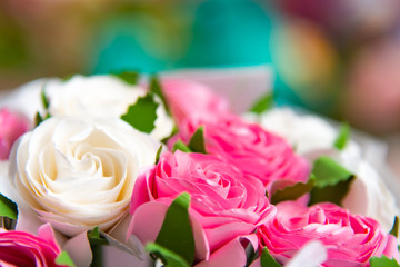 Fake flowers. Bouquet of beautiful white and pink roses. In concept Valentine day and wedding. 