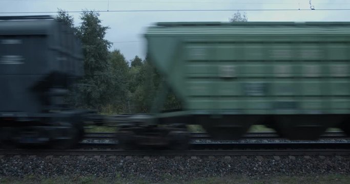 Freight train boxcar wagons passing