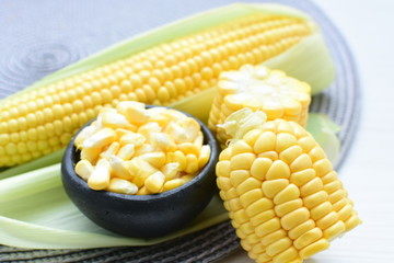  fresh organic corn in leaf, shelled and in pieces