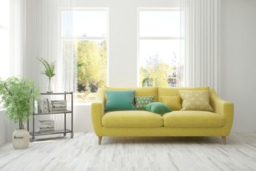 Fototapeta premium Stylish room in white color with sofa and autumn landscape in window. Scandinavian interior design. 3D illustration