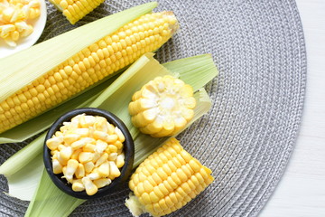  fresh organic corn in leaf, shelled and in pieces