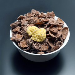 corn flakes in a white bowl.