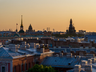 Fototapeta premium City at sunset. Beautiful evening picturesque summer panorama of St. Petersburg, Russia
