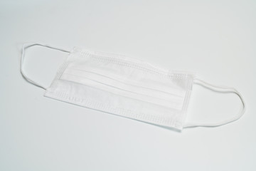 Protective medical mask on white background.