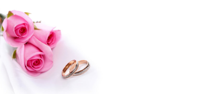 Gold Wedding Ring And Rose Flower Bouquet. Wedding Horizontal Background.