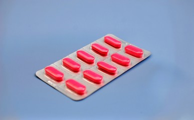 pills on a gray background, healthcare theme