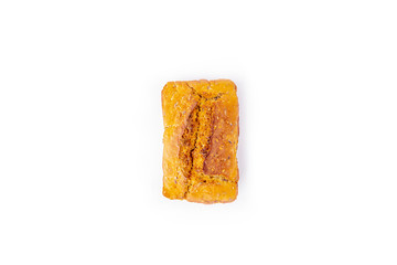 One loaf of whole-grain bread isoalted on white background. Freshly baked homemade square bread. Organic and vegetarian food concept. Copy space for text, flat lay