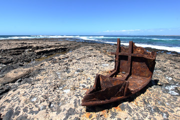 Remains of a boat wreck at the El Toston Lighthouse, Fuerteventura, Canary Islands