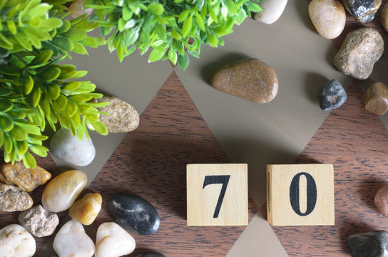 Number 70, Rating, Award, Design with number cube colorful stone in natural concept.