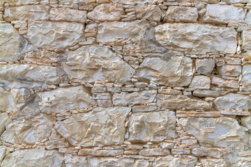 Fragment of an ancient stone wall in Cyprus, Background