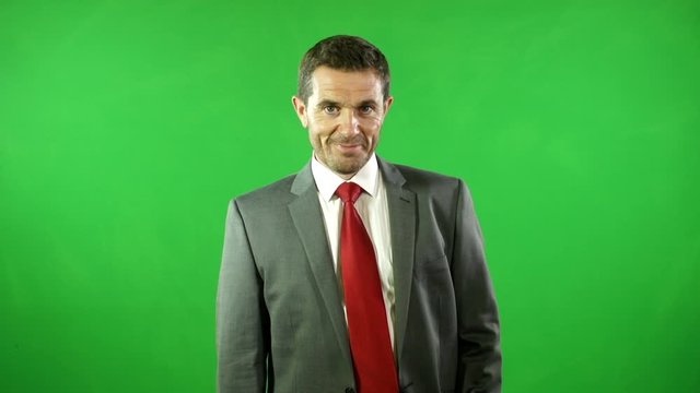 Handsome Caucasian Male in his 40s - Wearing different uniforms to represent many Jobs / Occupations - Green Screen Chroma Key Background. Stock Video Footage