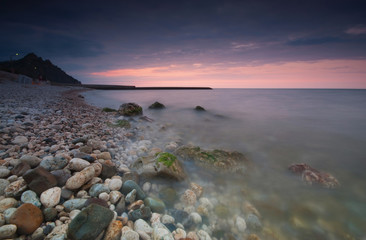rocky seashore at sunrise