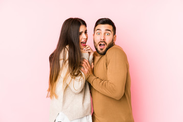 Fototapeta premium Young caucasian couple isolated scared and afraid.