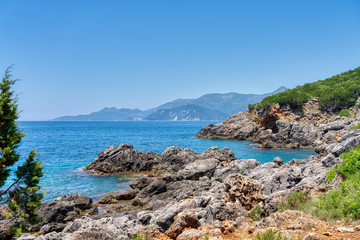 Fototapeta premium landscape with rocky coast near the city of ammoundia, greece