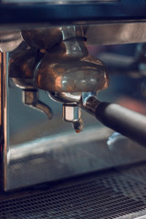  Holder in the coffee machine. The process of making coffee