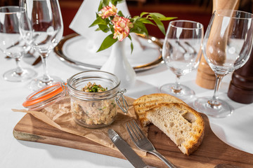 Cracklings, greaves spread with raosted bread