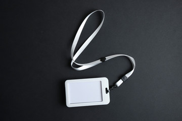 Security Badge on black background, event invitation concept, job