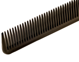 teeth of the comb close isolated on white