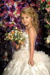 Princess in a white dress. Flowergirl, event.